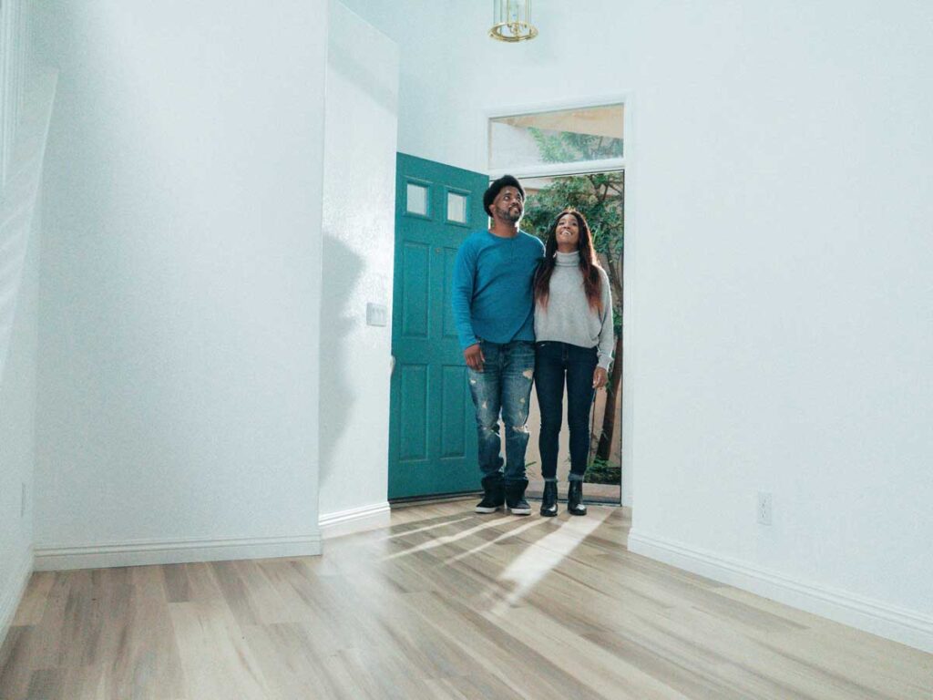 Couple Entering Empty Home